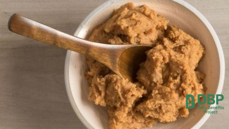 Miso paste in a wooden bowl, packed with probiotics