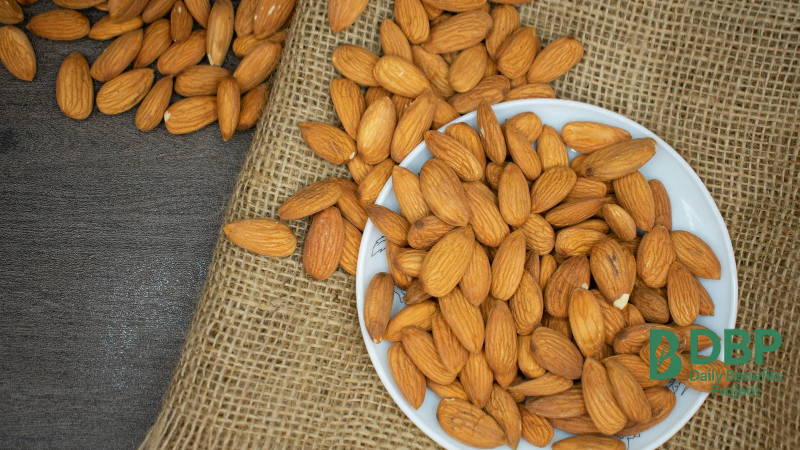 Almonds as a source of vitamin E for immunity A bowl of almonds on burlap cloth, providing vitamin E for immune support